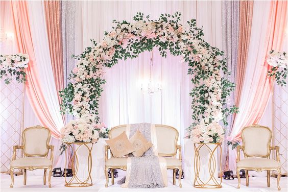 Draping in white and peach with a mixed floral circle